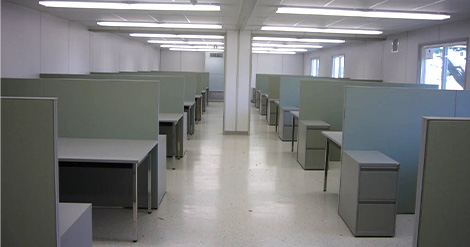 Interior of an office with cubicles in a modular building